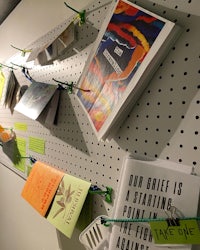 a peg board with a lot of different things on it